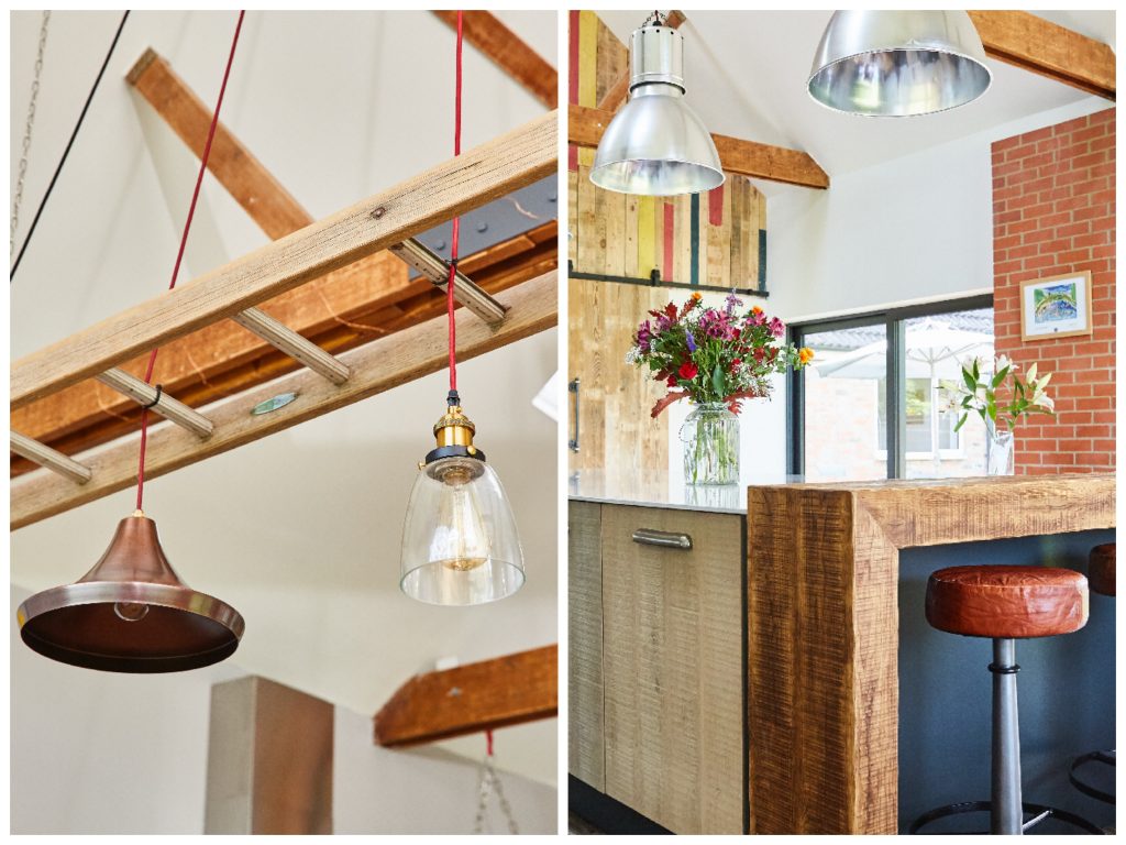 Reclaimed ladder separates lights and reclaimed wrap around breakfast bar 