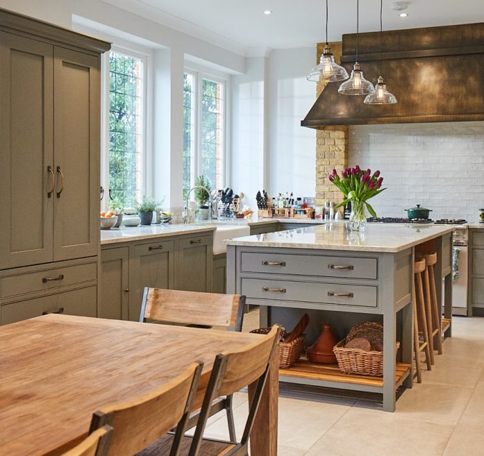 Grey moss pot board island in large open plan kitchen