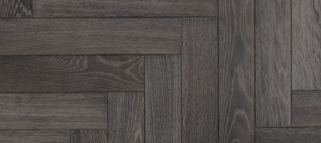 Parquet wood flooring in a black grey finish