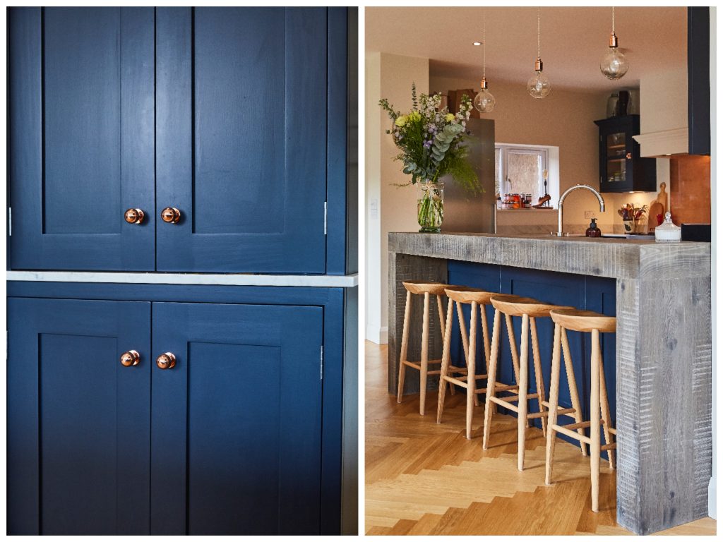 Oak bum stool by DeVol against blue kitchen cabinets