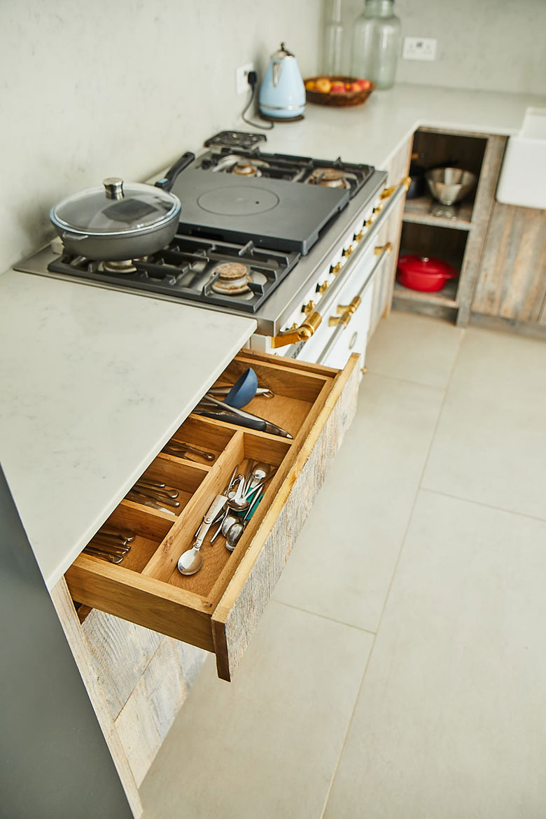 Solid oak drawer box with insert dividing utensils