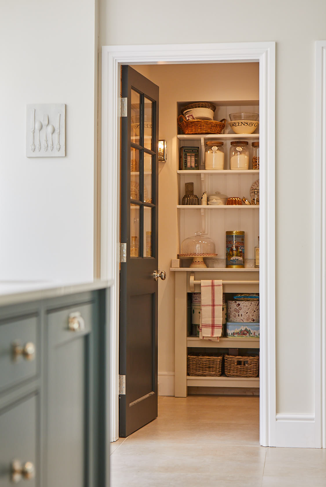 Door leads to bespoke walk in pantry