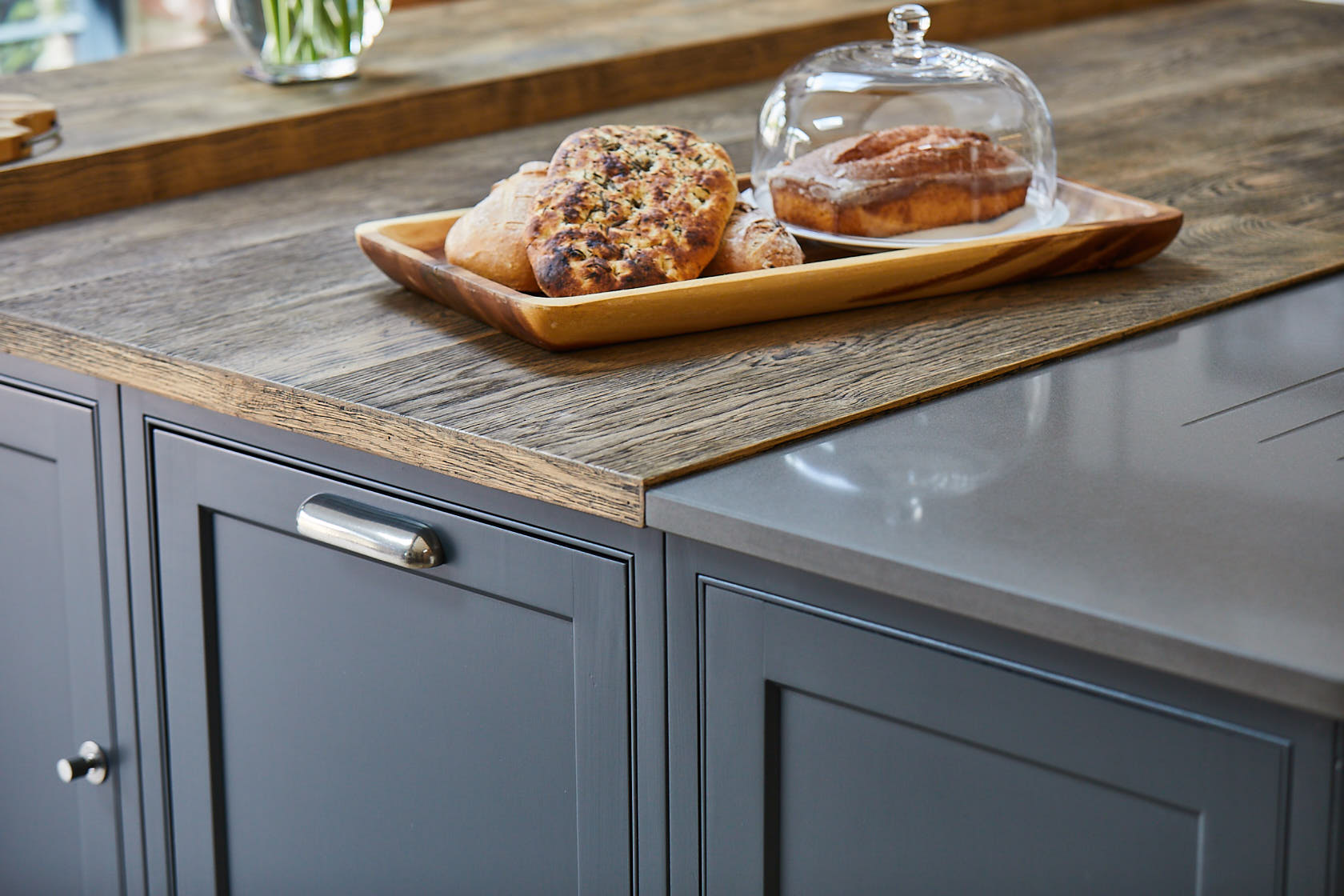 Lamp black shaker cabinets with engineered oak wood worktop and Finesse pewter cup handle