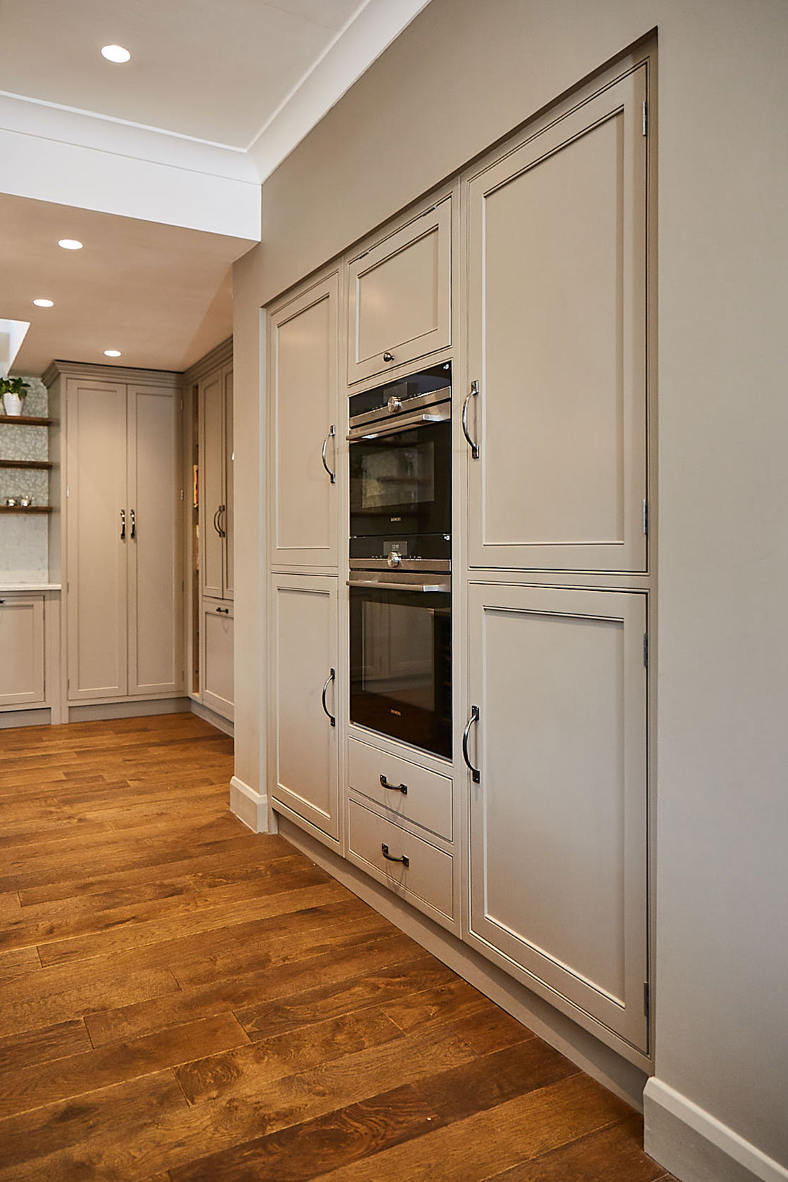 Integrated eye level Siemens oven in traditional painted cabinet