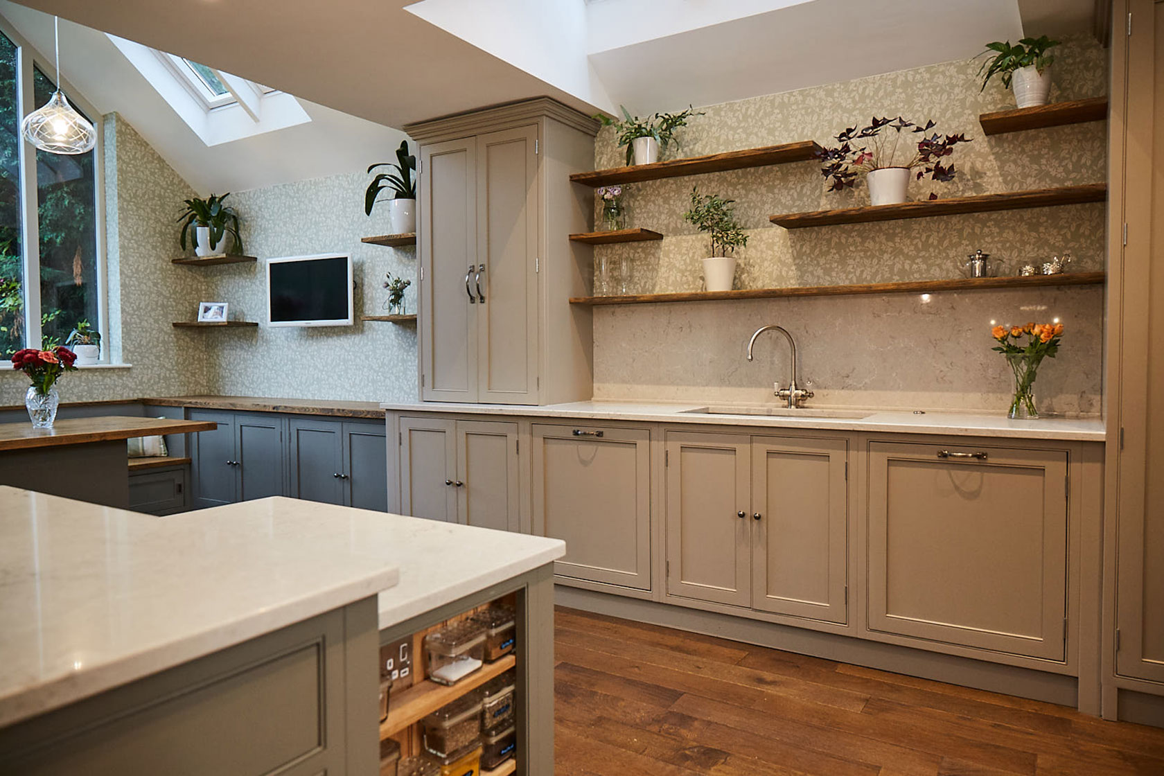 Traditional painted bespoke kitchen sink run with oak flooring