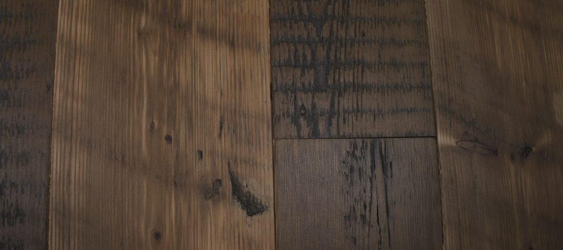 Knot on reclaimed pine floor board