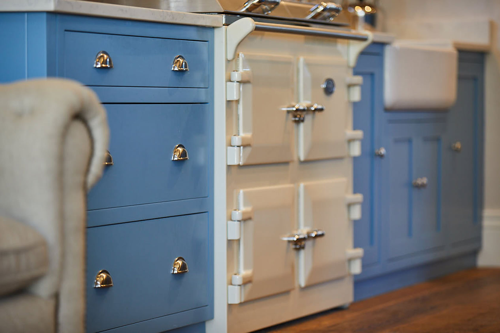 Cream Everhot flush with light blue shaker cabinets