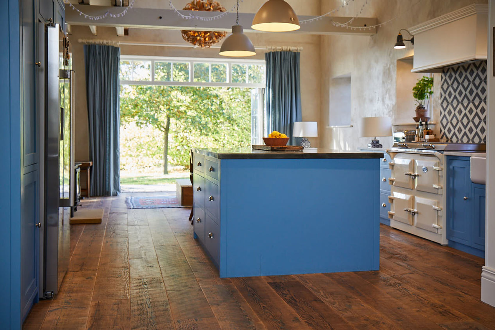Flat baby blue end panel with pinewood engineered floor boards