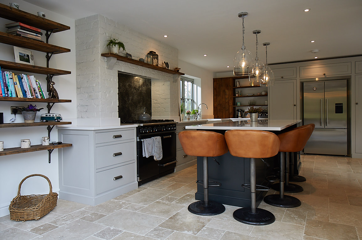 Brown leather bar stool around kitchen island