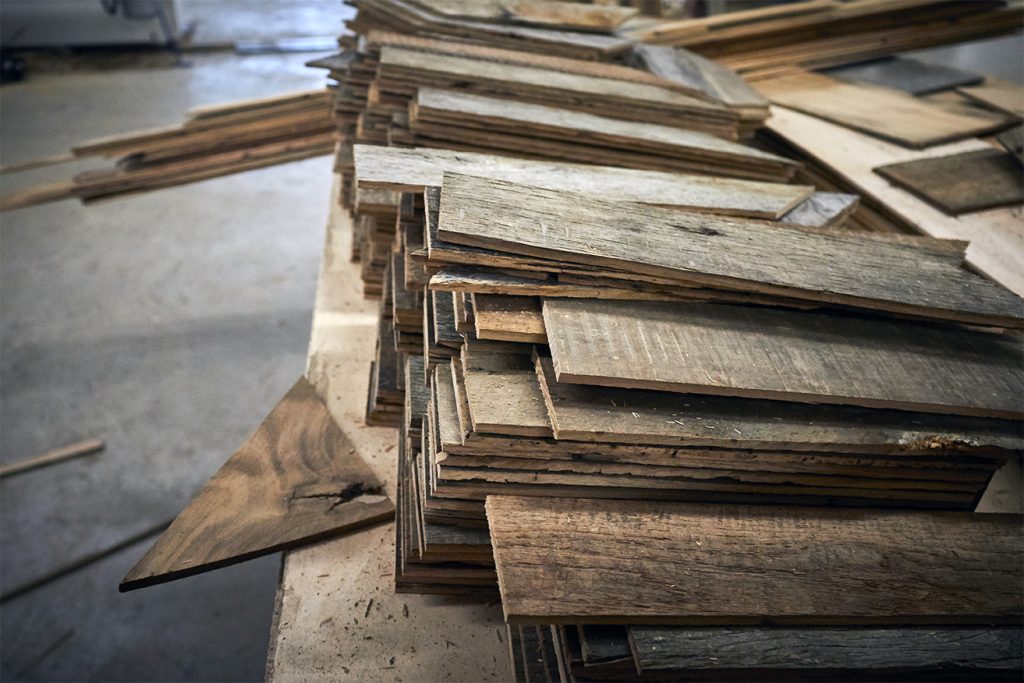 Reclaimed timber stacked up ready for process