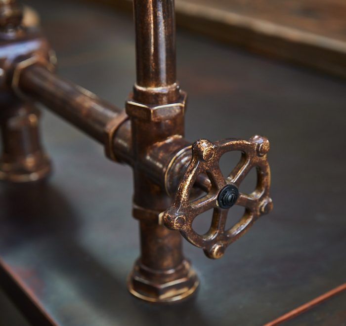 Antique kitchen tap with industrial turn handles