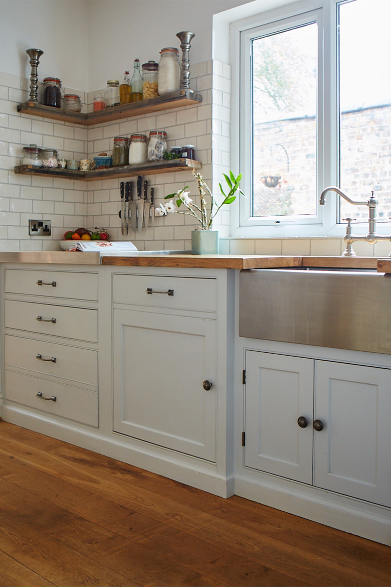 Bespoke painted sink run with stainless steel belfast sink and reclaimed pine worktops