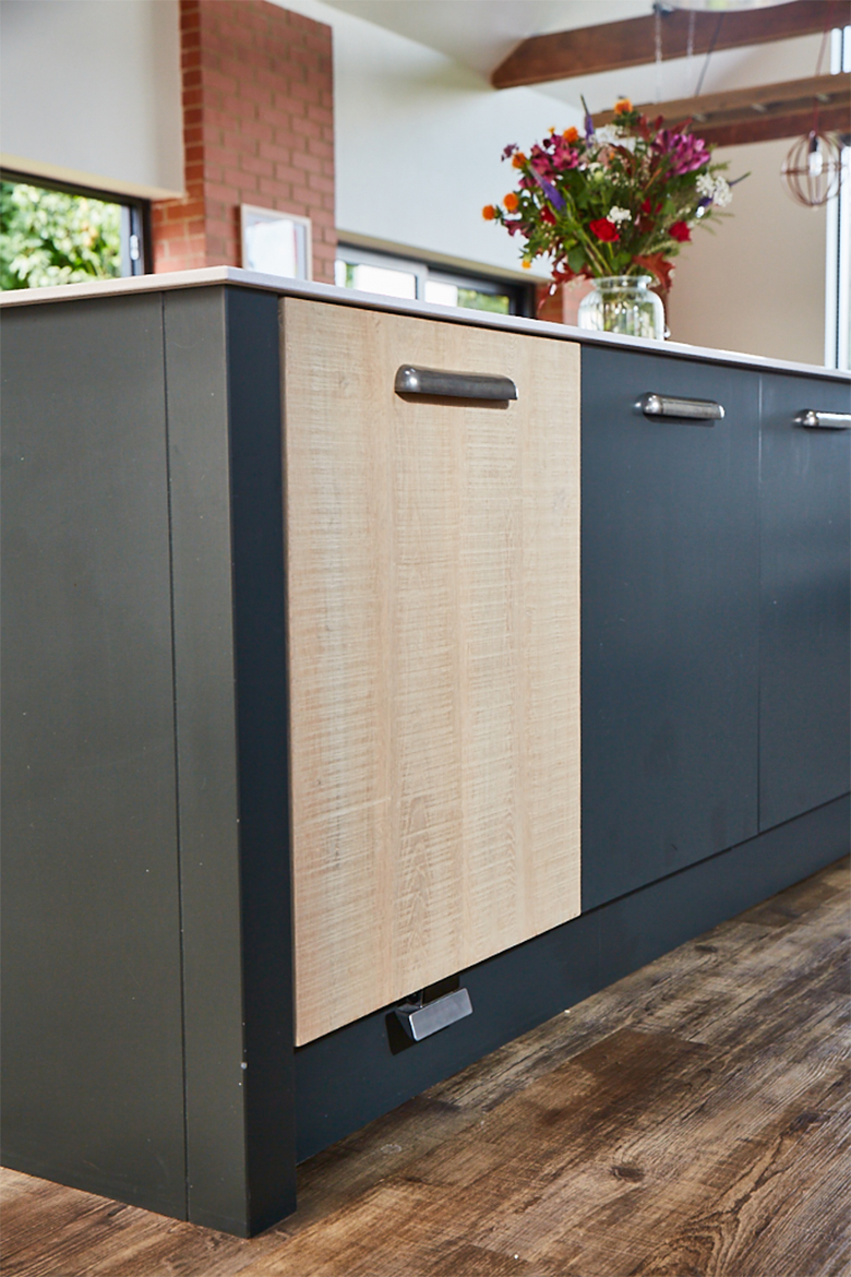 Bespoke kitchen unit with integrated cargo bin from hafele and push foot pedal