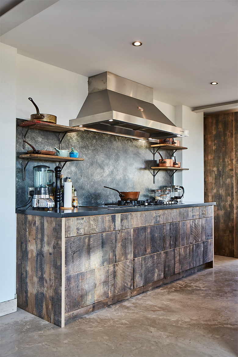 Reclaimed engineered pan drawers with Lacanche stainless steel hood and zinc backsplash