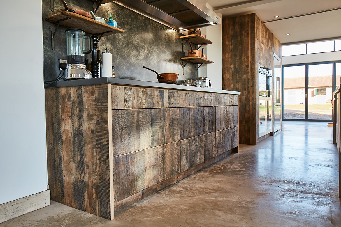 Reclaimed engineered pine wood drawers with zinc bespoke kitchen worktop