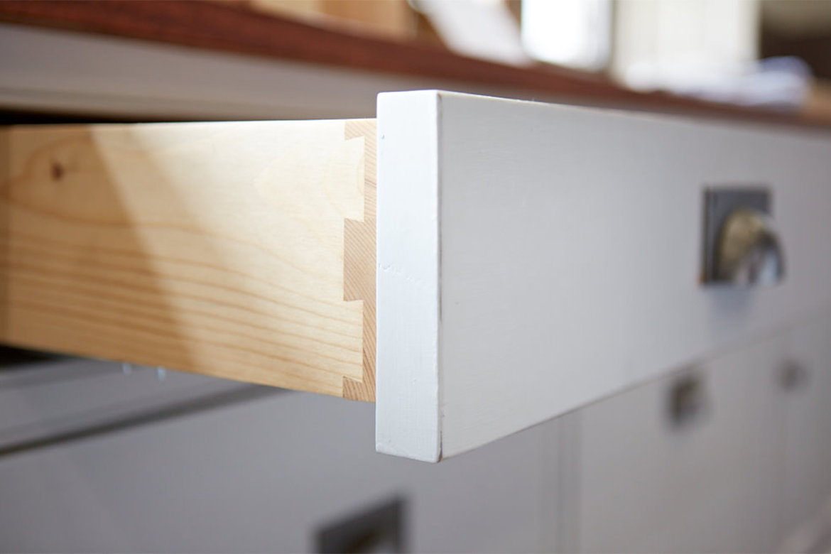 Solid pine drawer box with dovetail joints and pewter cup handles