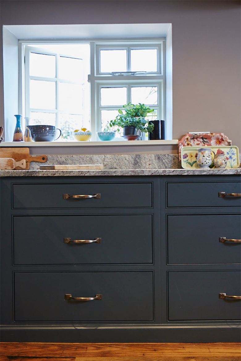 Bespoke kitchen pan drawers with pewter croft pull handles and granite work surface