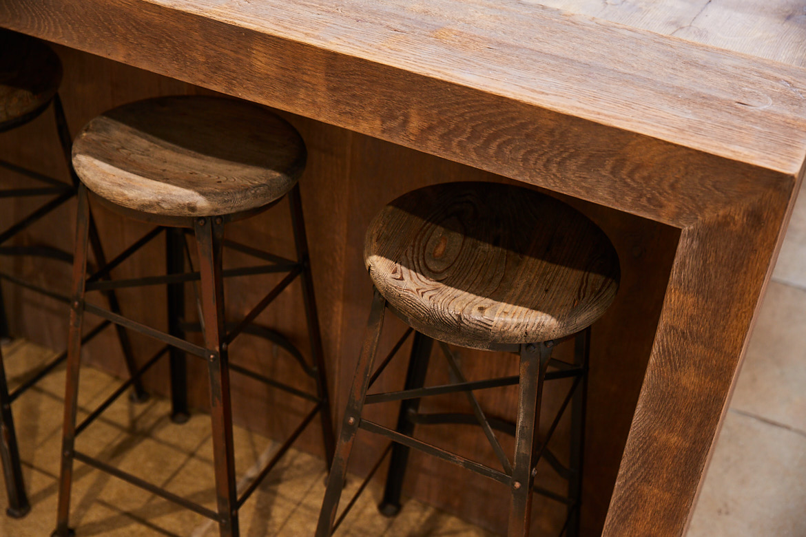 Close up of bespoke breakfast bar made from reclaimed oak