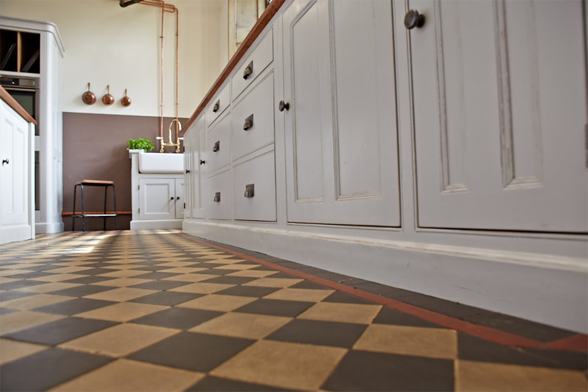 Tiled floor with bespoke kitchen units