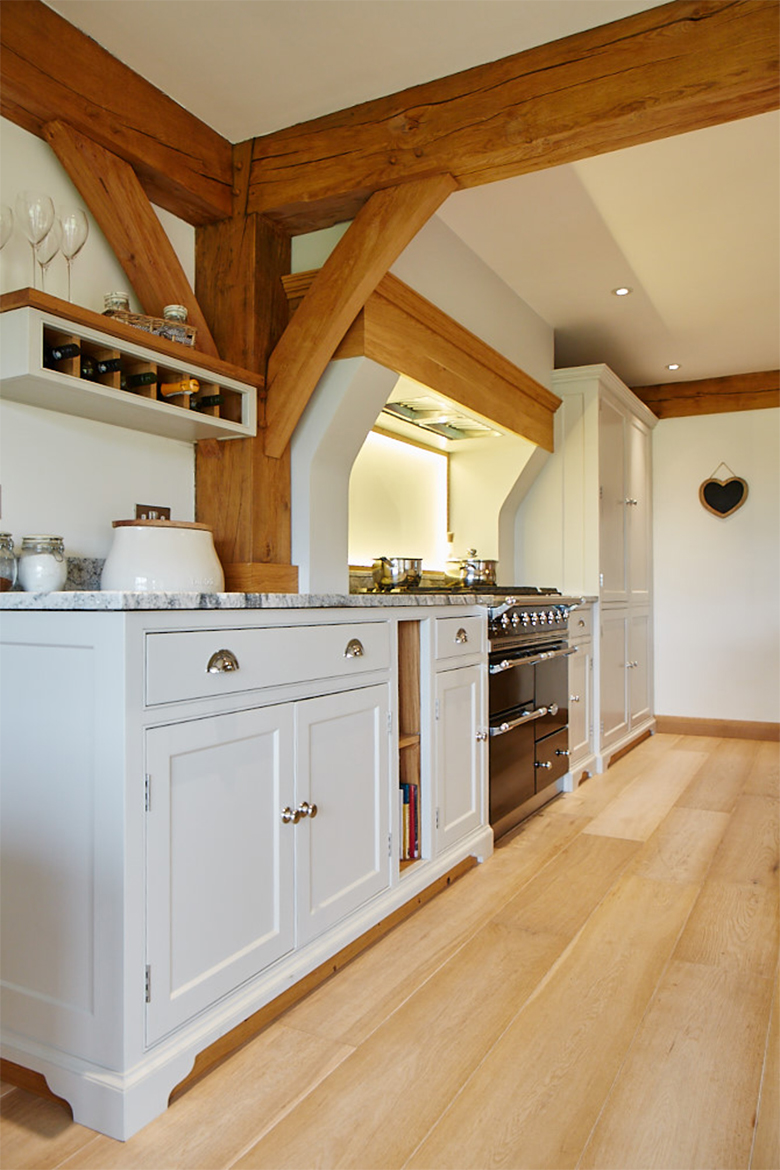 Open wine bottle racks made from solid oak and painted with Little Greene paint