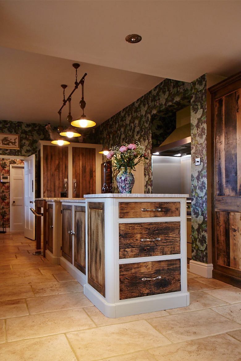 Bespoke kitchen island painted in light Little Greene and reclaimed rustic oak wood drawer fronts and granite worktop