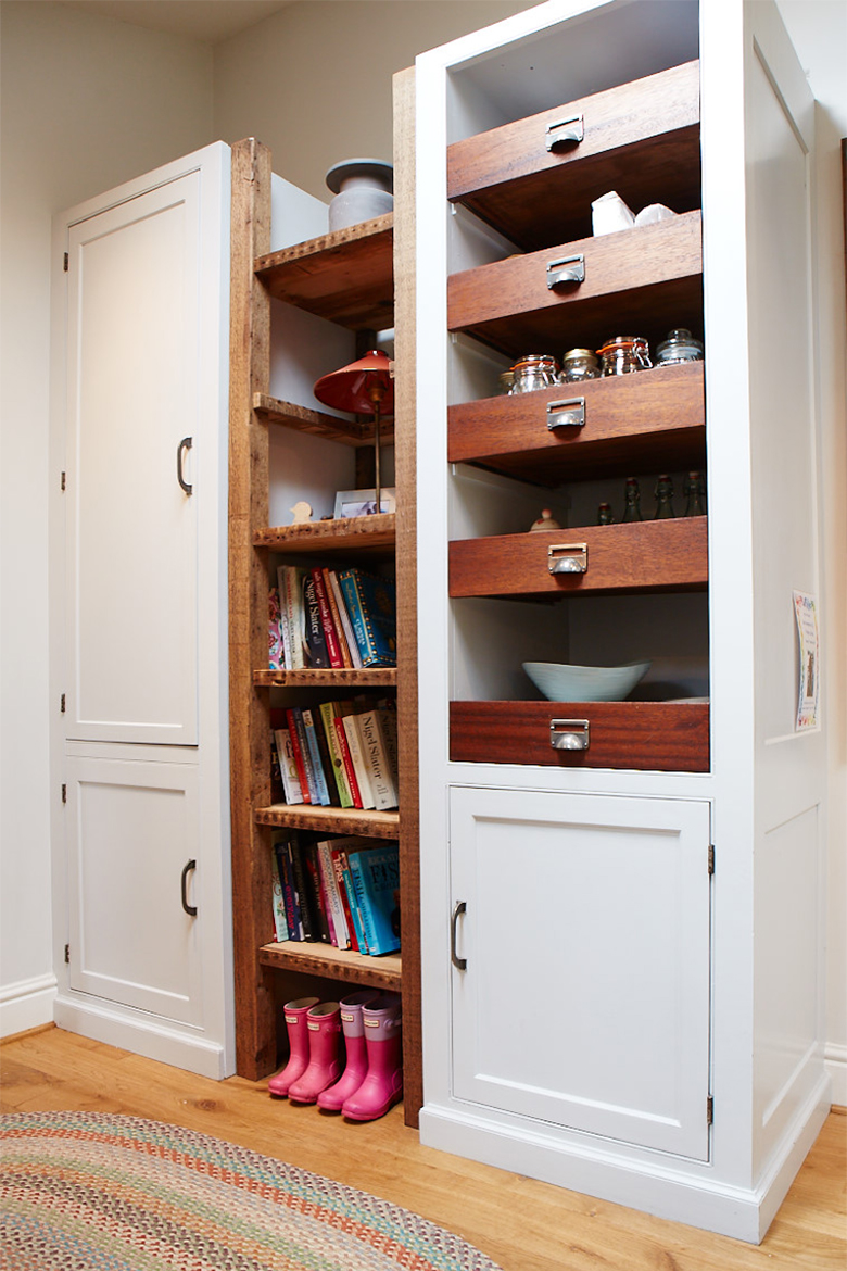 Bespoke painted larder unit with exposed teak drawer boxes and open shelving from reclaimed pine