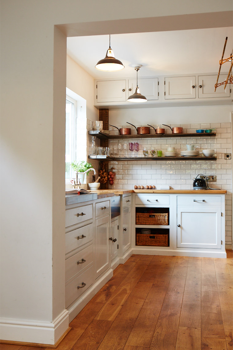 Bespoke painted kitchen with reclaimed pine worktops metro tile walls and open shelves