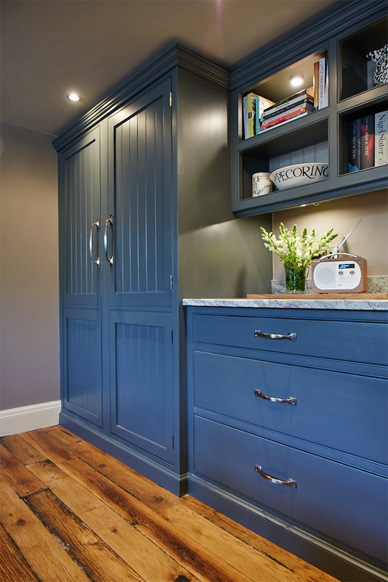 Integrated fridge in bespoke painted kitchen cabinet