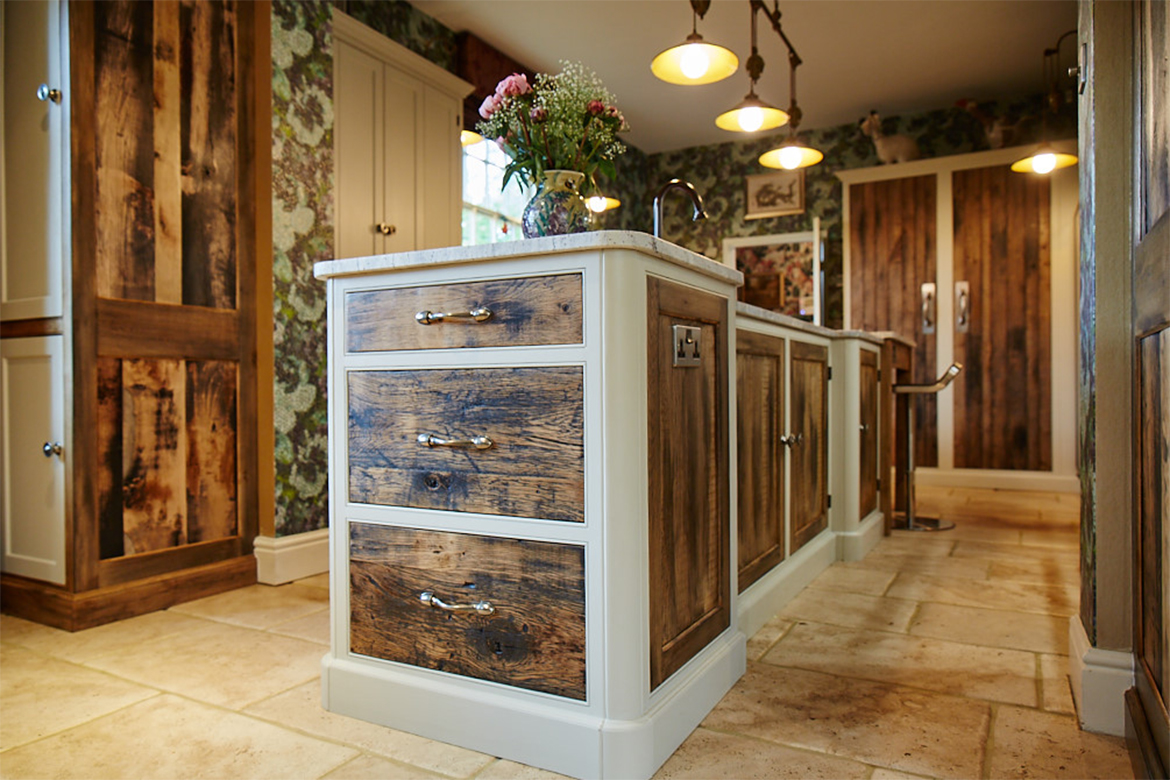 Bespoke kitchen pan drawers manufactured from reclaimed rustic oak framed with painted light grey by Little Greene