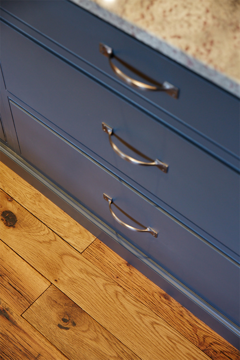 Painted kitchen pan drawers with croft pull handles painted in farrow and ball