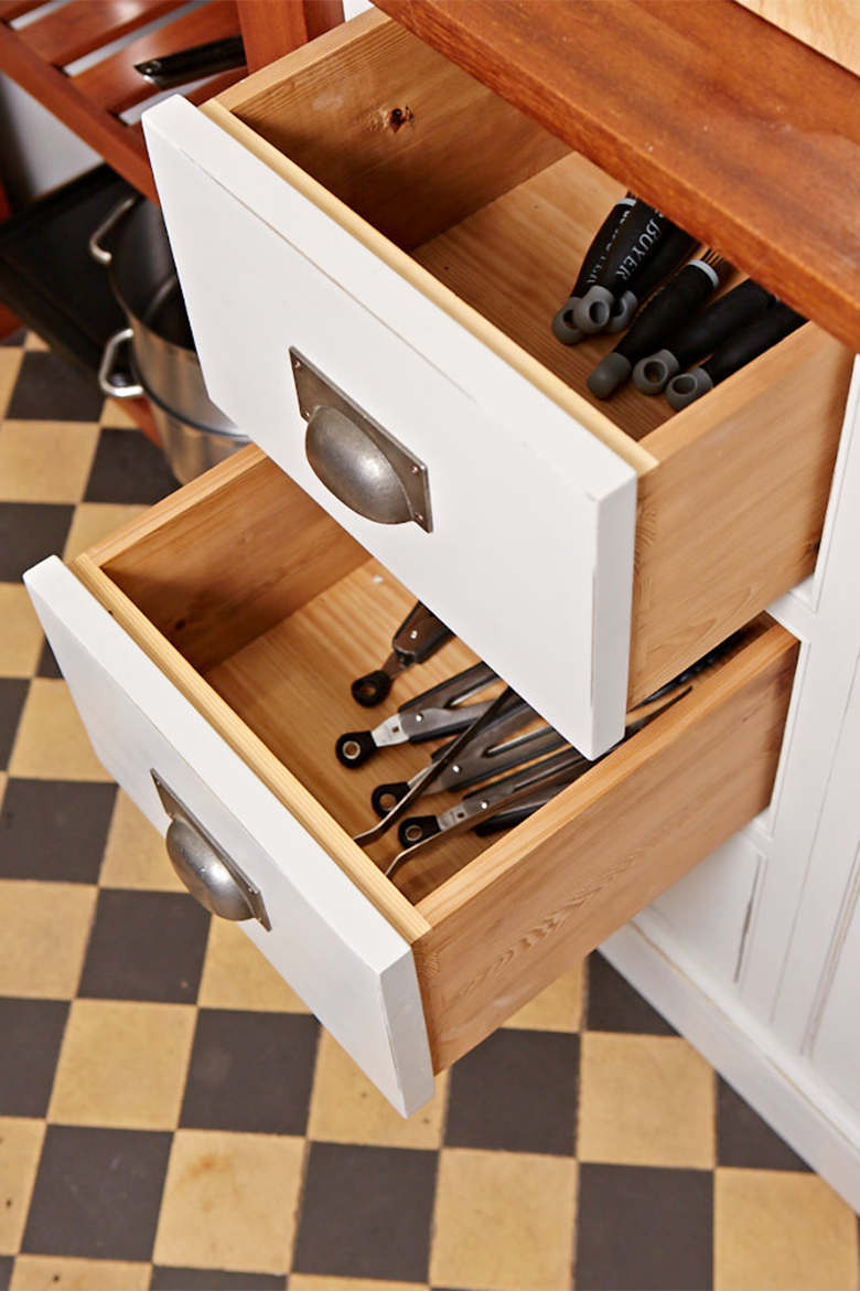 Bespoke painted pan drawers with pewter cup handles