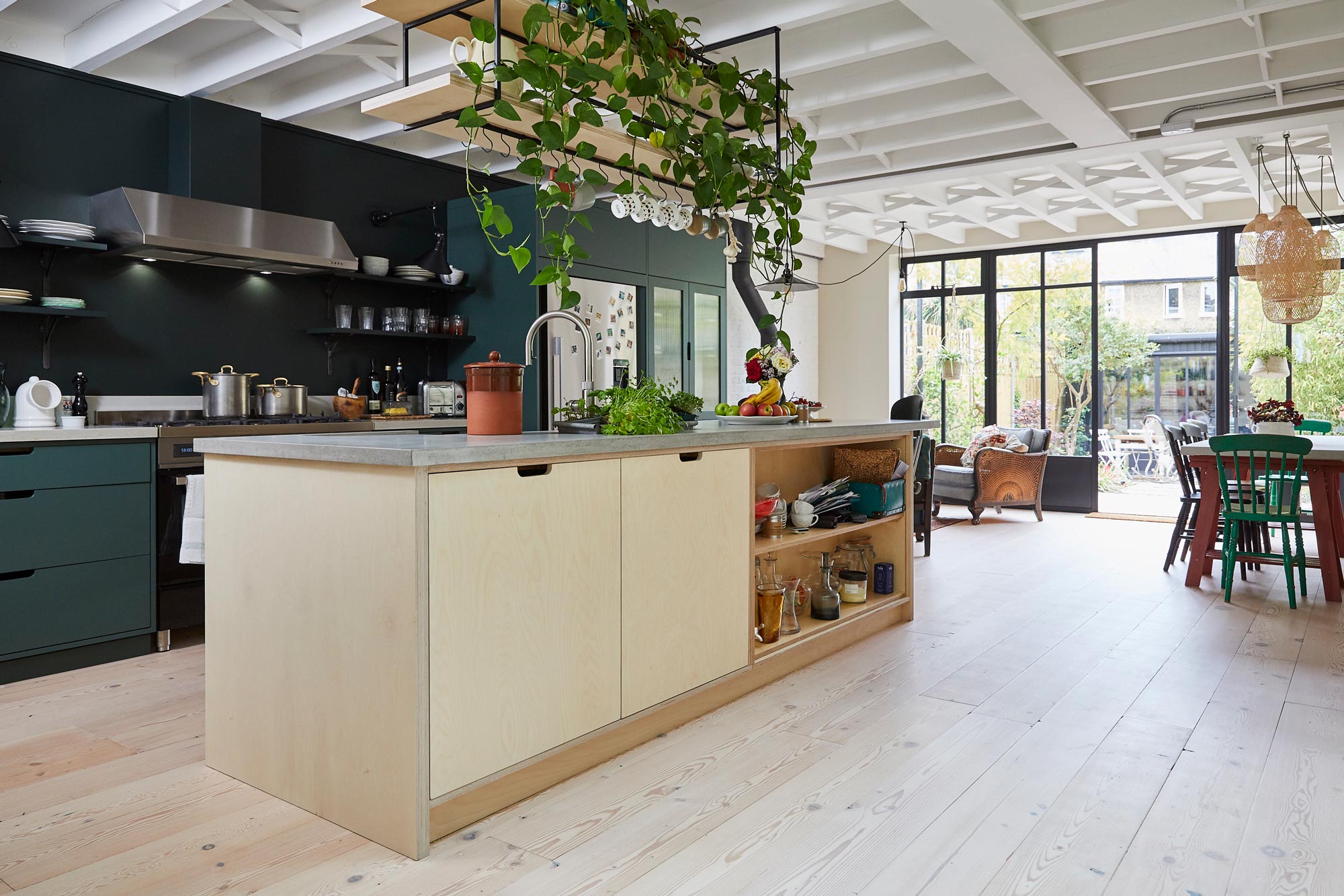 Birch plywood kitchen island with solid concrete worktops