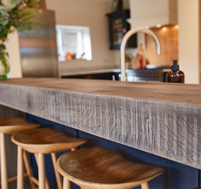 Band sawn oak breakfast bar and clean solid oak wooden bar stools