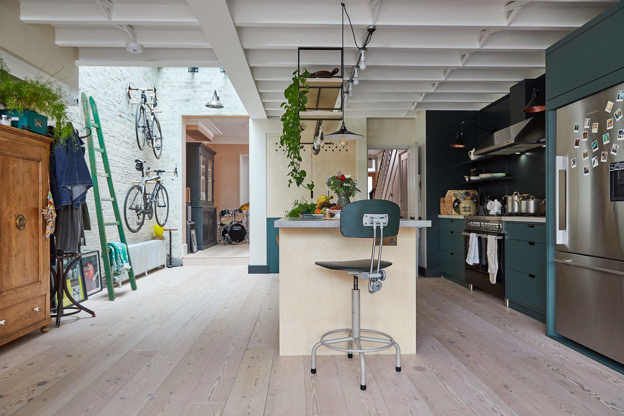 Industrial barstool under birch plywood island