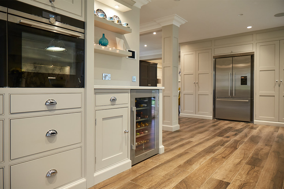 Wine cooler and American stainless fridge freezer integrated in to shaker grey cabinets