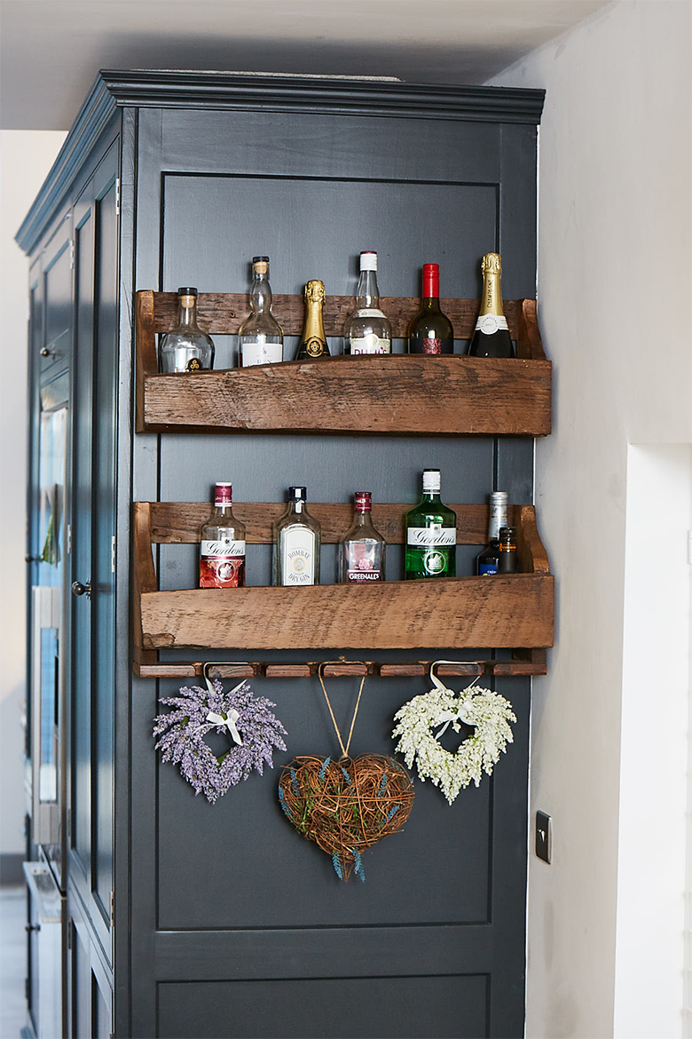 Rustic reclaimed pine wood gin holder with hanging hearts