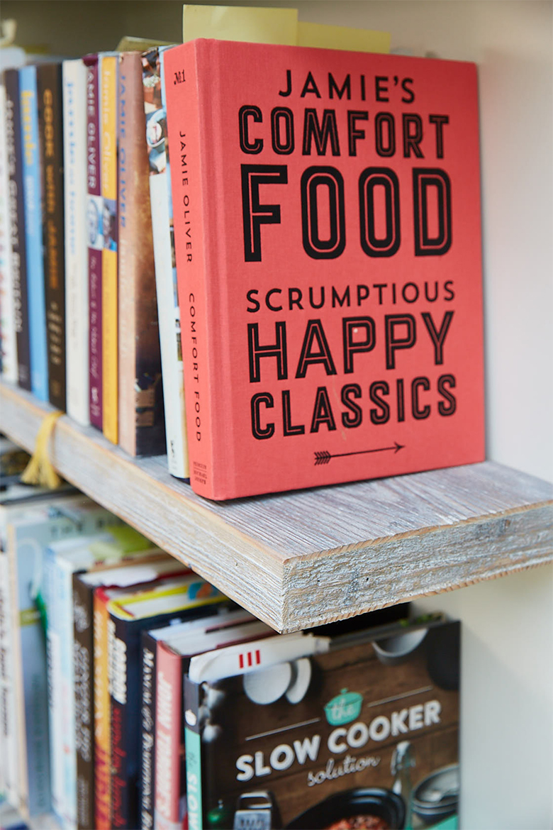 Floating chunky bookshelves engineered from reclaimed pine