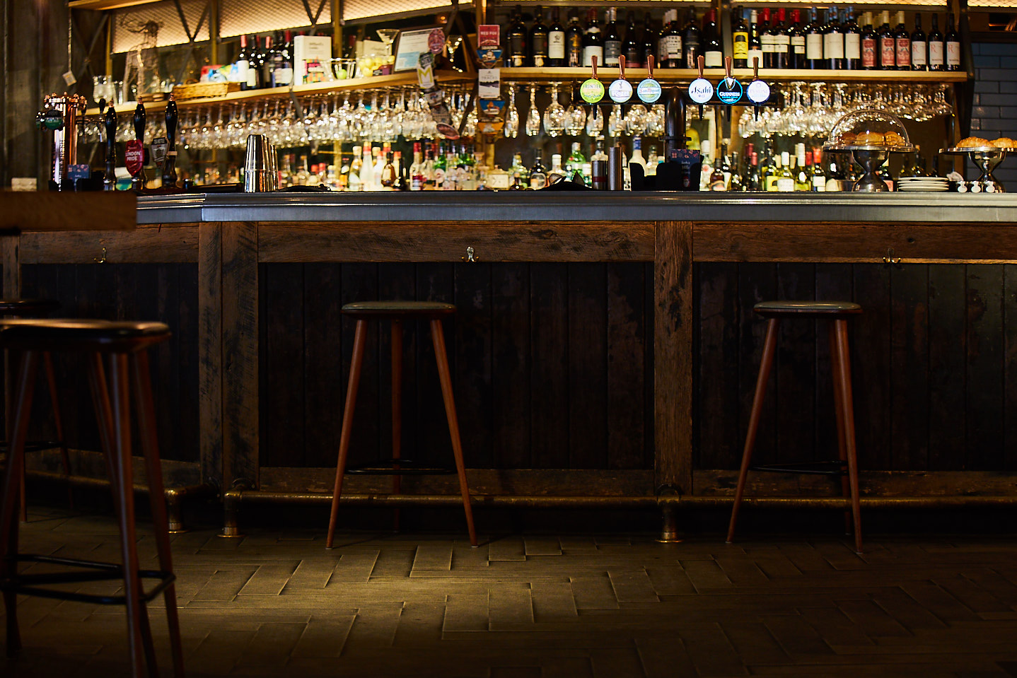 Reclaimed oak bar with stools