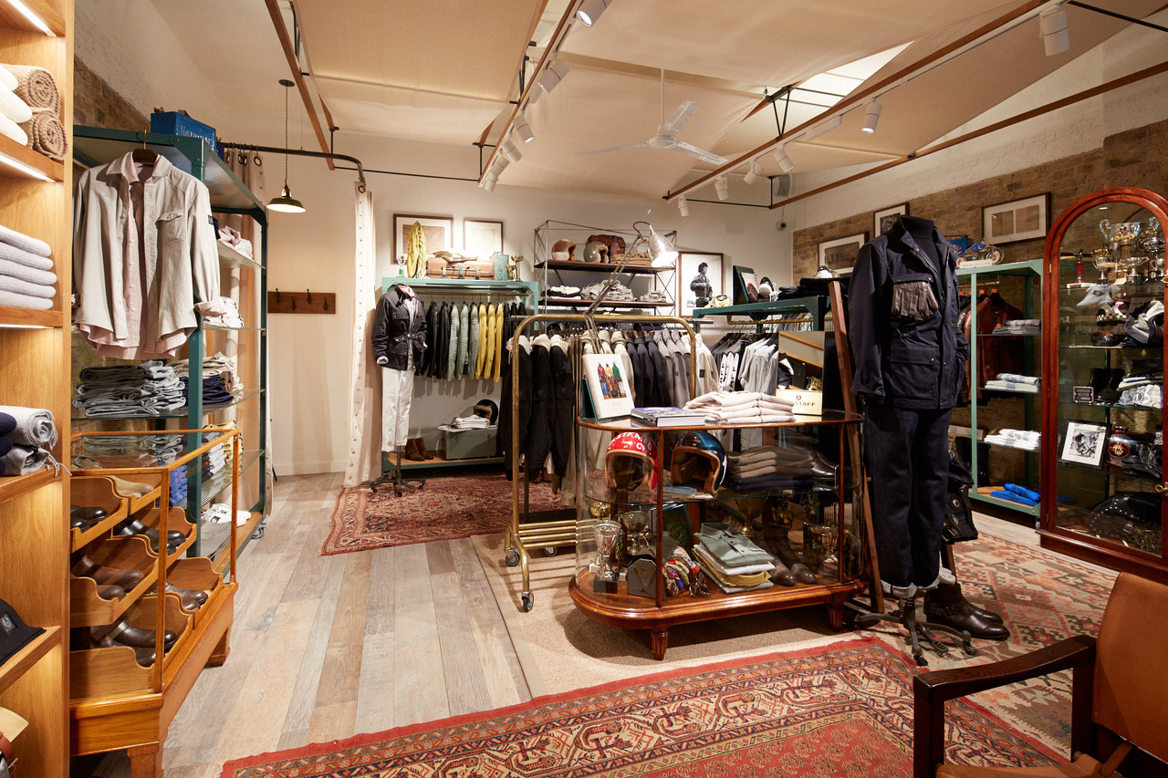 Belstaff interior with original furniture displaying clothing