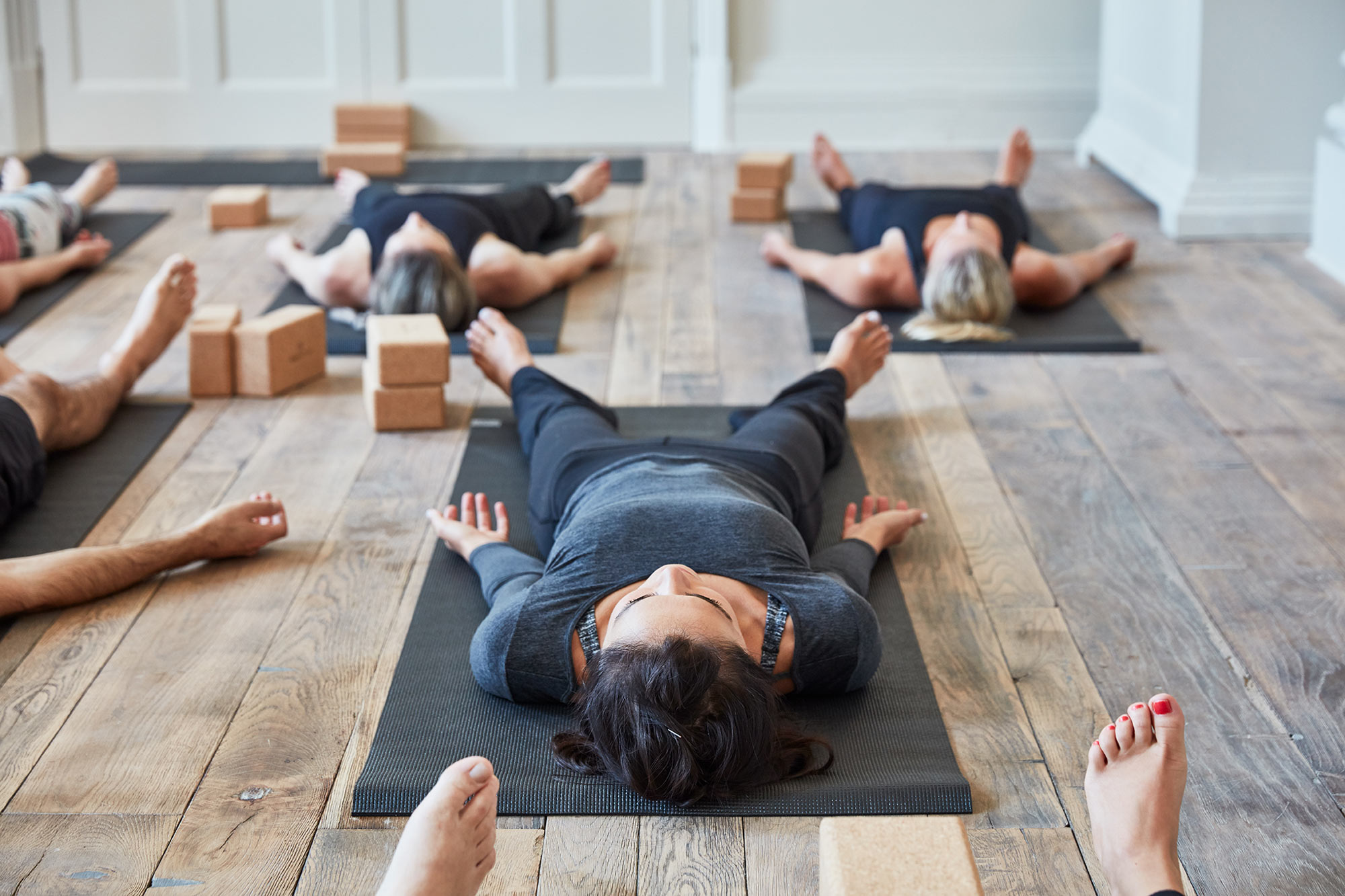 Yoga class on reclaimed oak floor