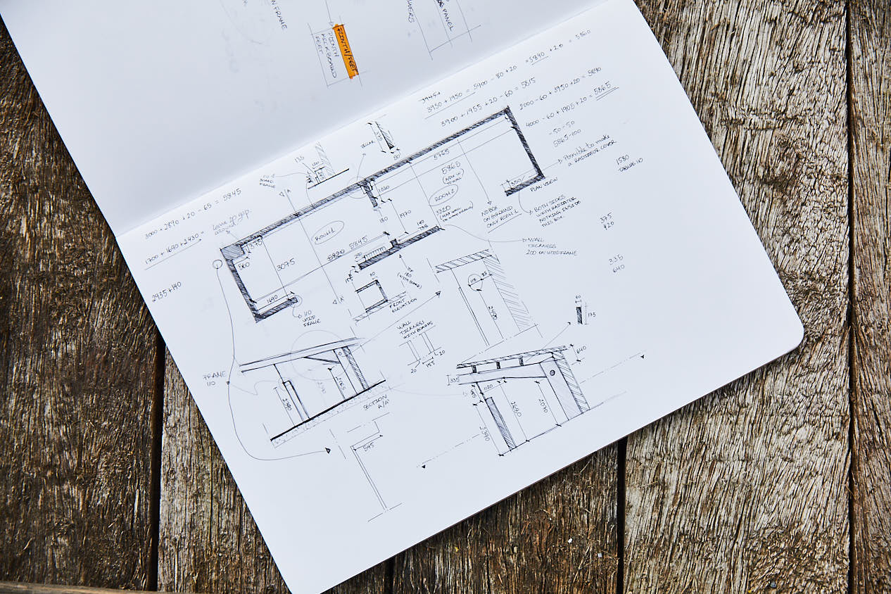 Hand drawn room layout on reclaimed wood top