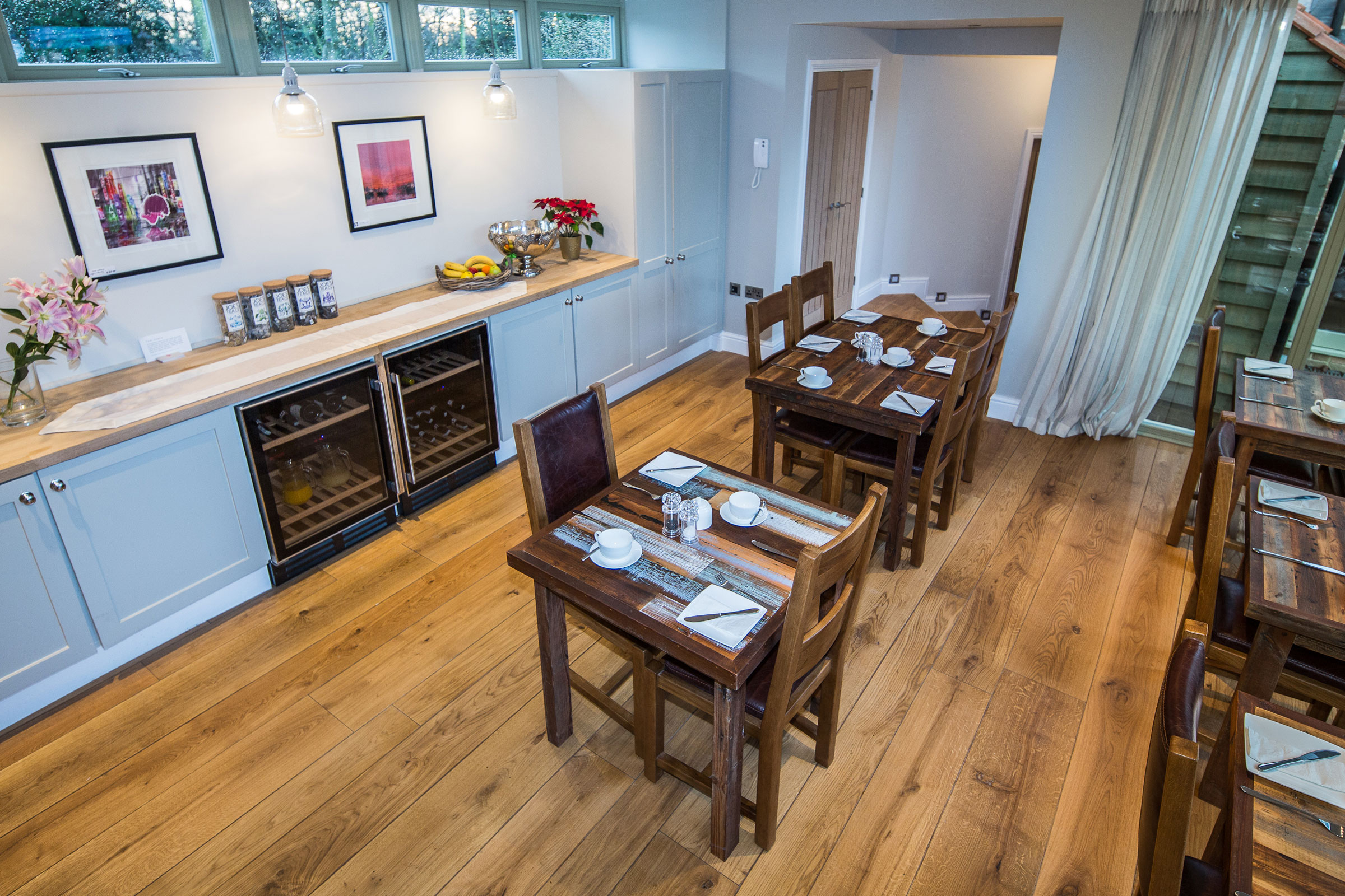 Bistro table and chairs on oak engineered floor