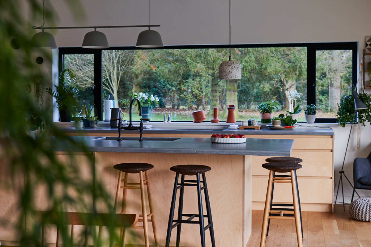 Light birch plywood kitchen with grey concrete worktops