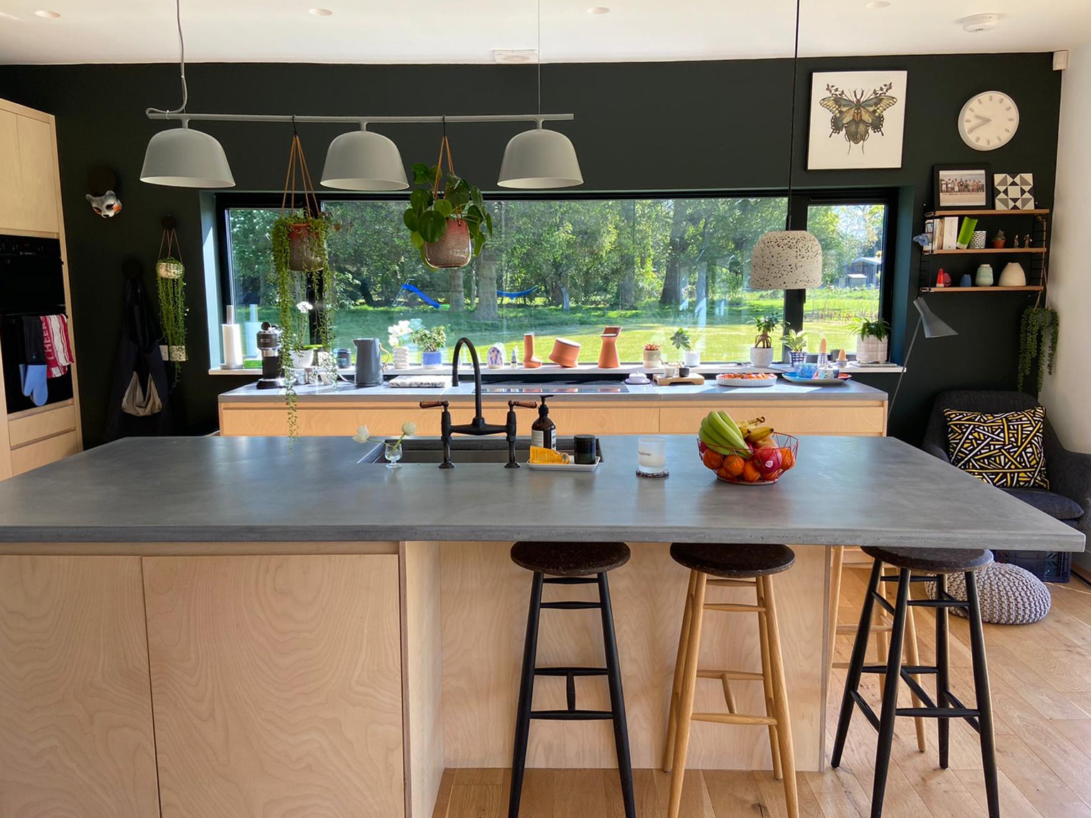 Kitchen island with sink in concrete worktop