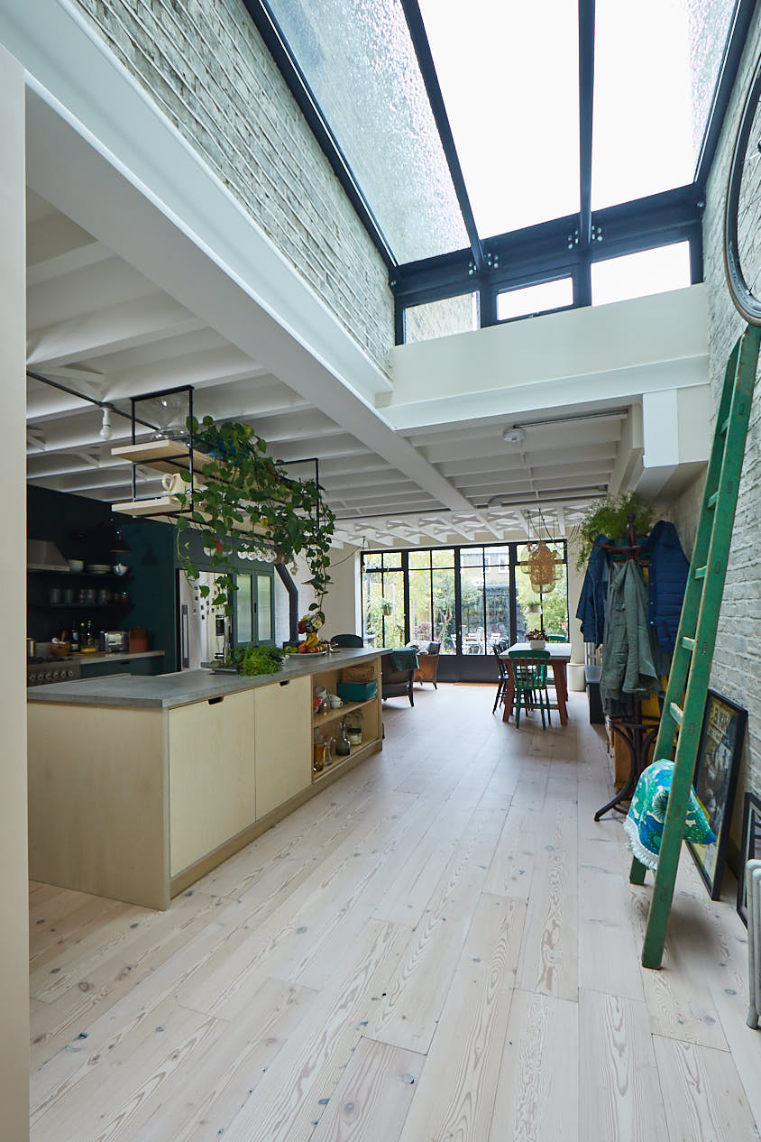 Birch plywood kitchen sits on whitewash pine floor