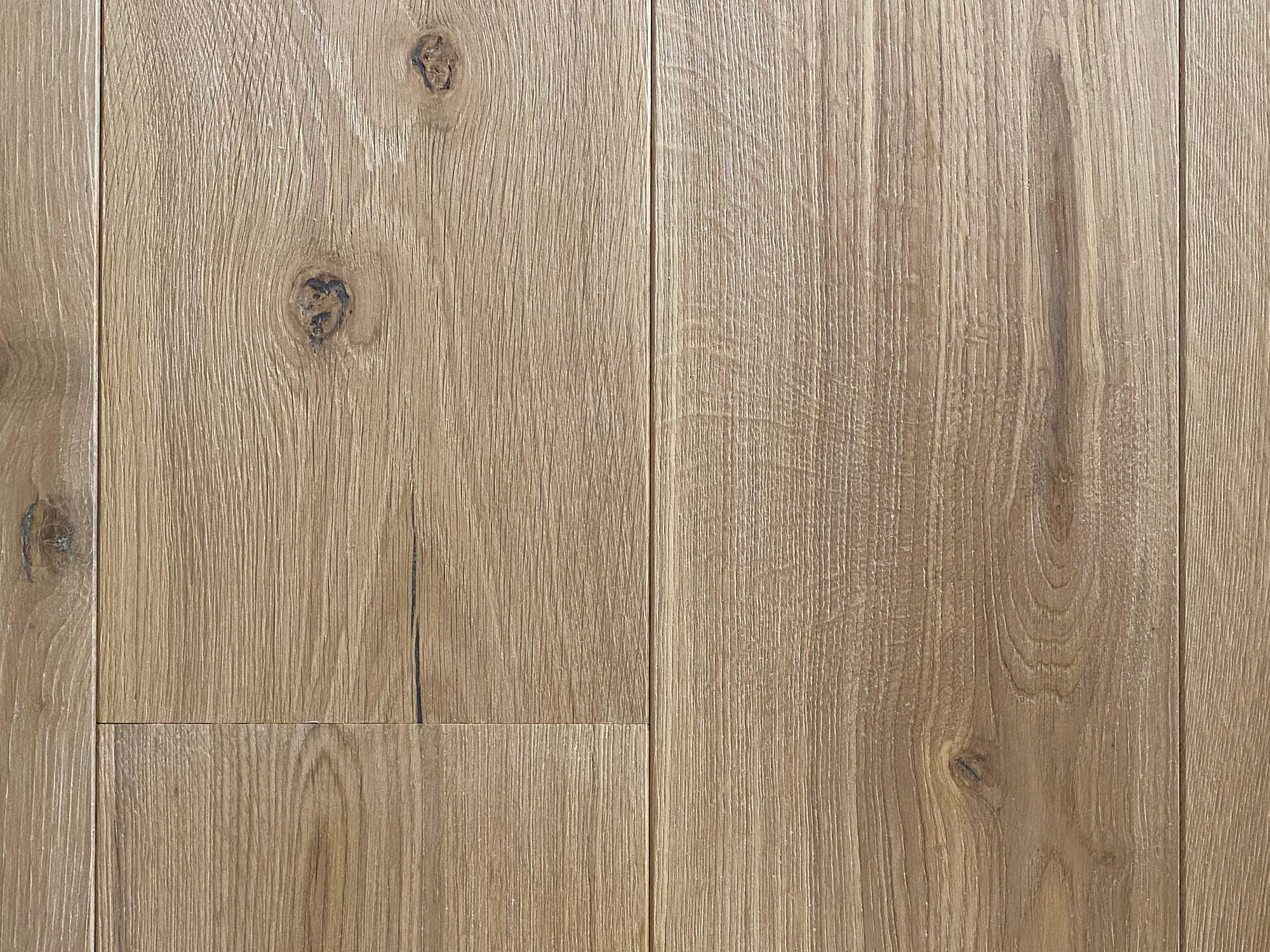 Knots in clean oak flooring