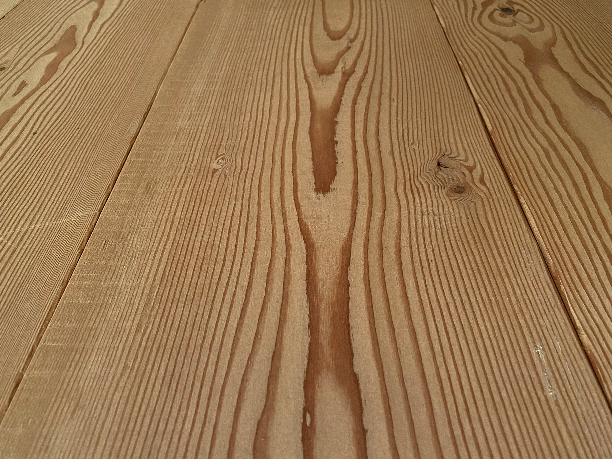 Close up of reclaimed pine flooring