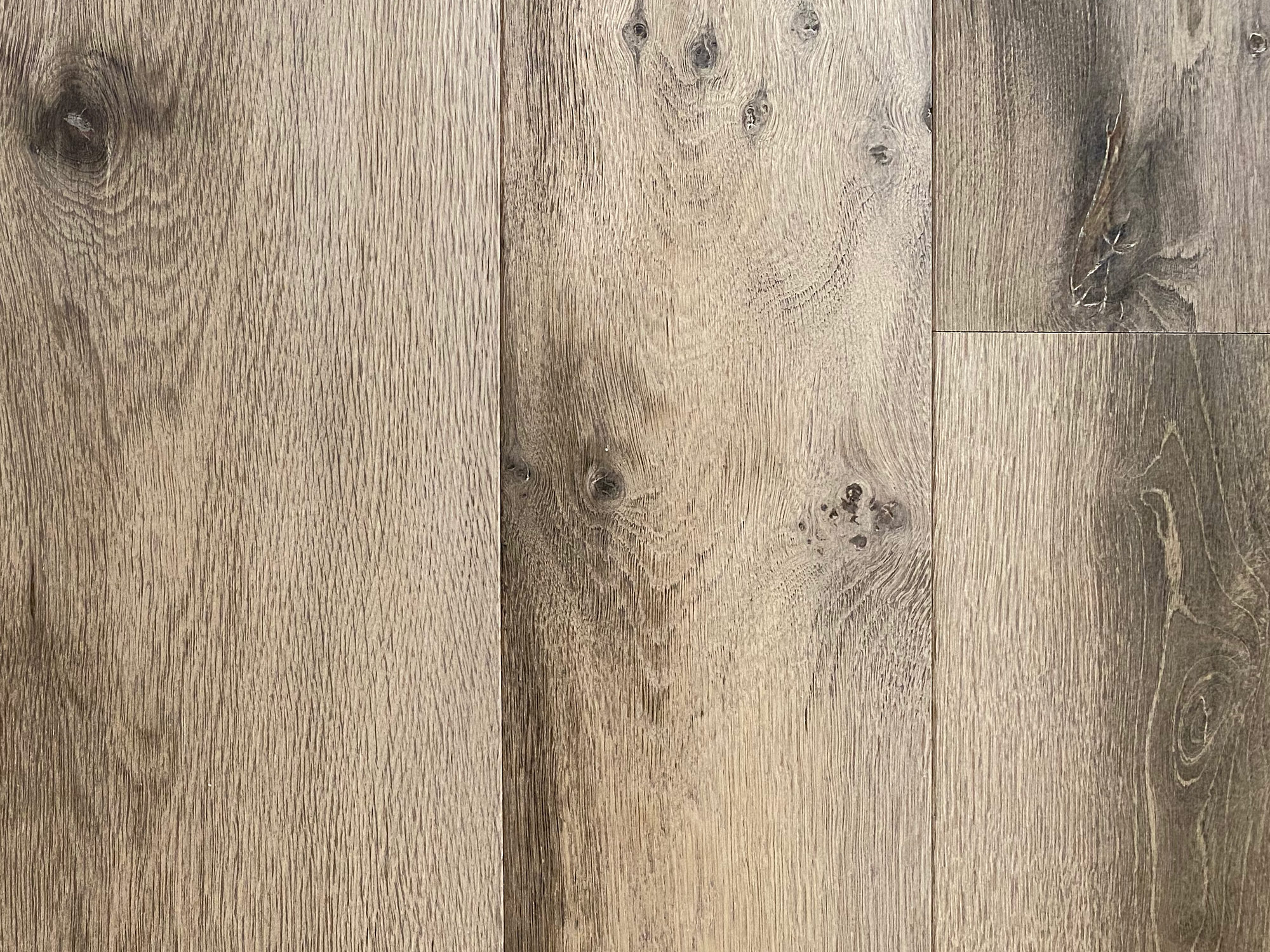 Knots on engineered grey oak flooring