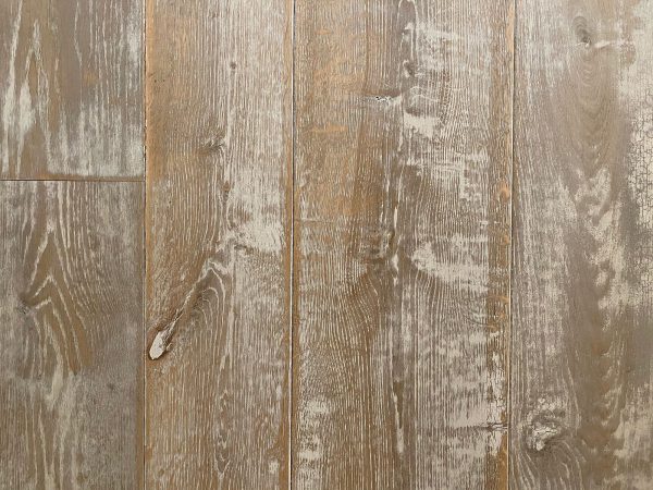 Crackled paint on oak flooring