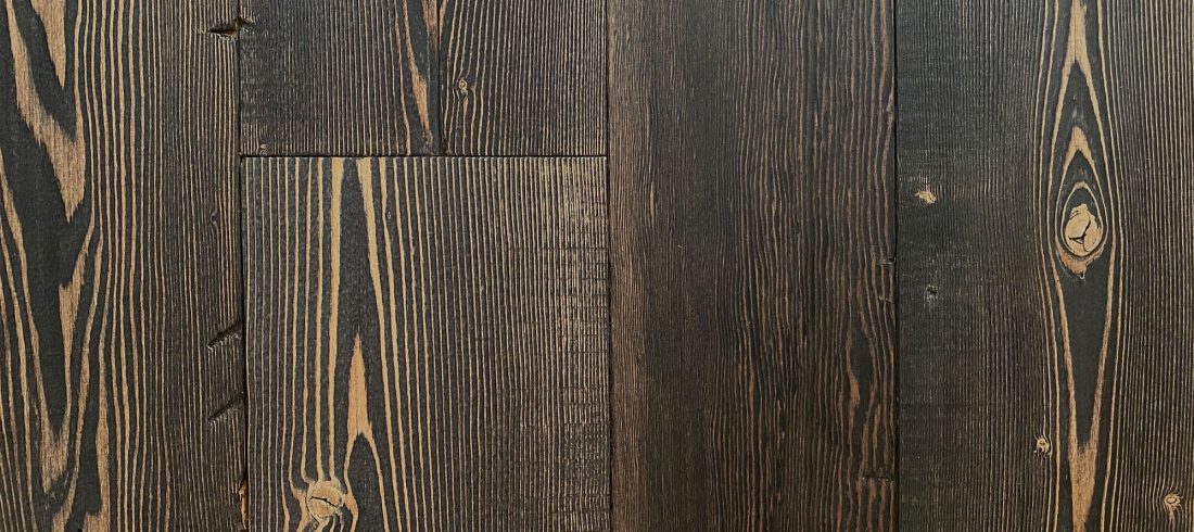 Black reclaimed floor boards